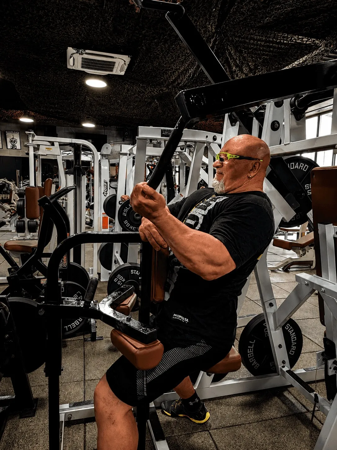 A member on a plate-loaded pulldown machine